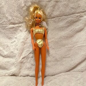 1991 Sun sensation Barbie doll 12 inch made in Malaysia.